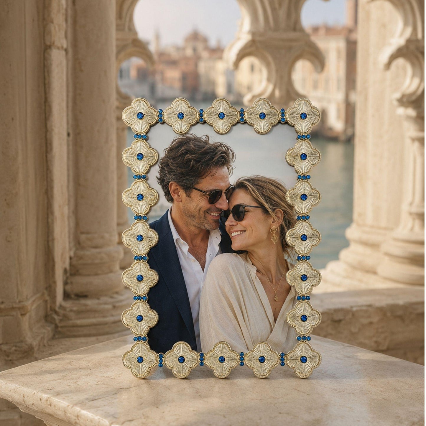 Gold Clover 4 by 6 Frame with Capri Blue Stones on a repeating quatrefoil pattern.