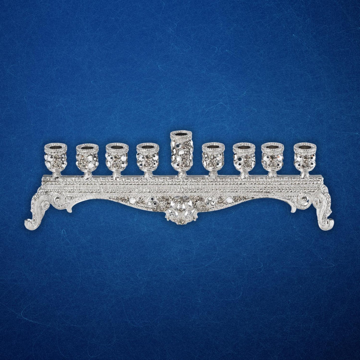 Abby Hanukkah Menorah on blue backdrop - OLIVIA RIEGEL®