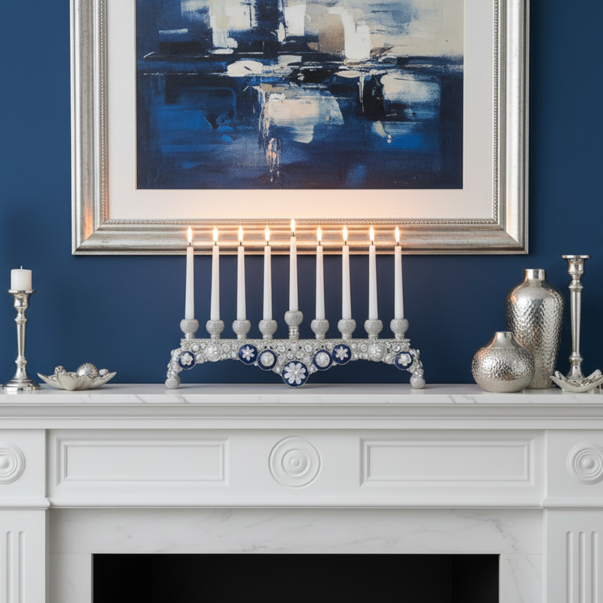 Lit Blue & White Charisma Menorah on a white mantel against a deep blue wall.