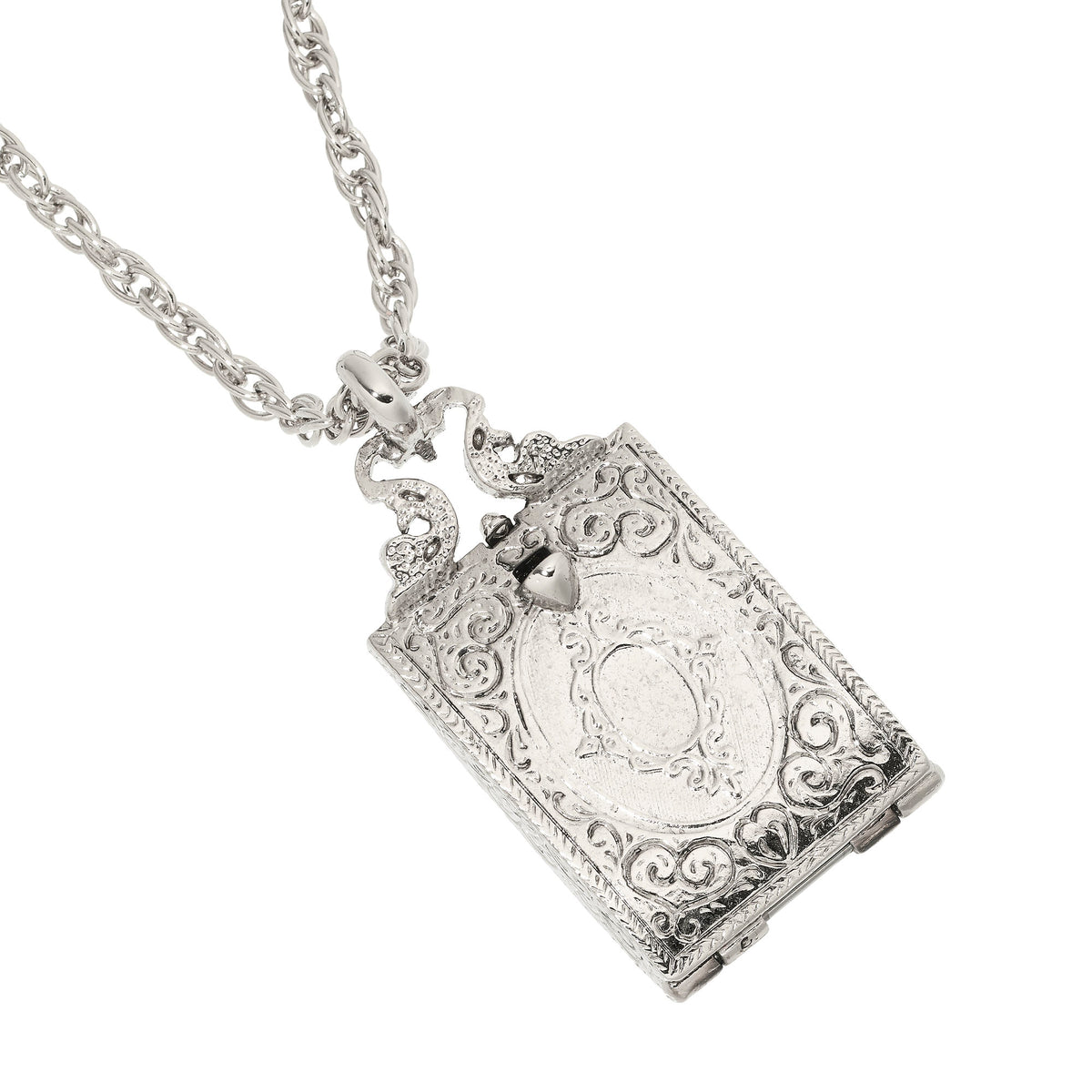 Ornate scrolled back of Silver Locket.