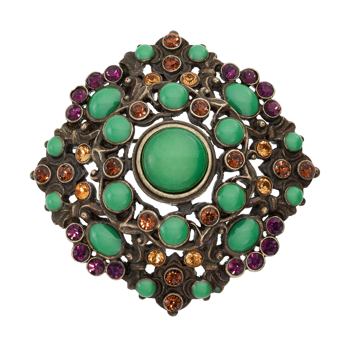 Bronze Brooch with Green Jewels in round and oval shapes. Rounded silhouette.