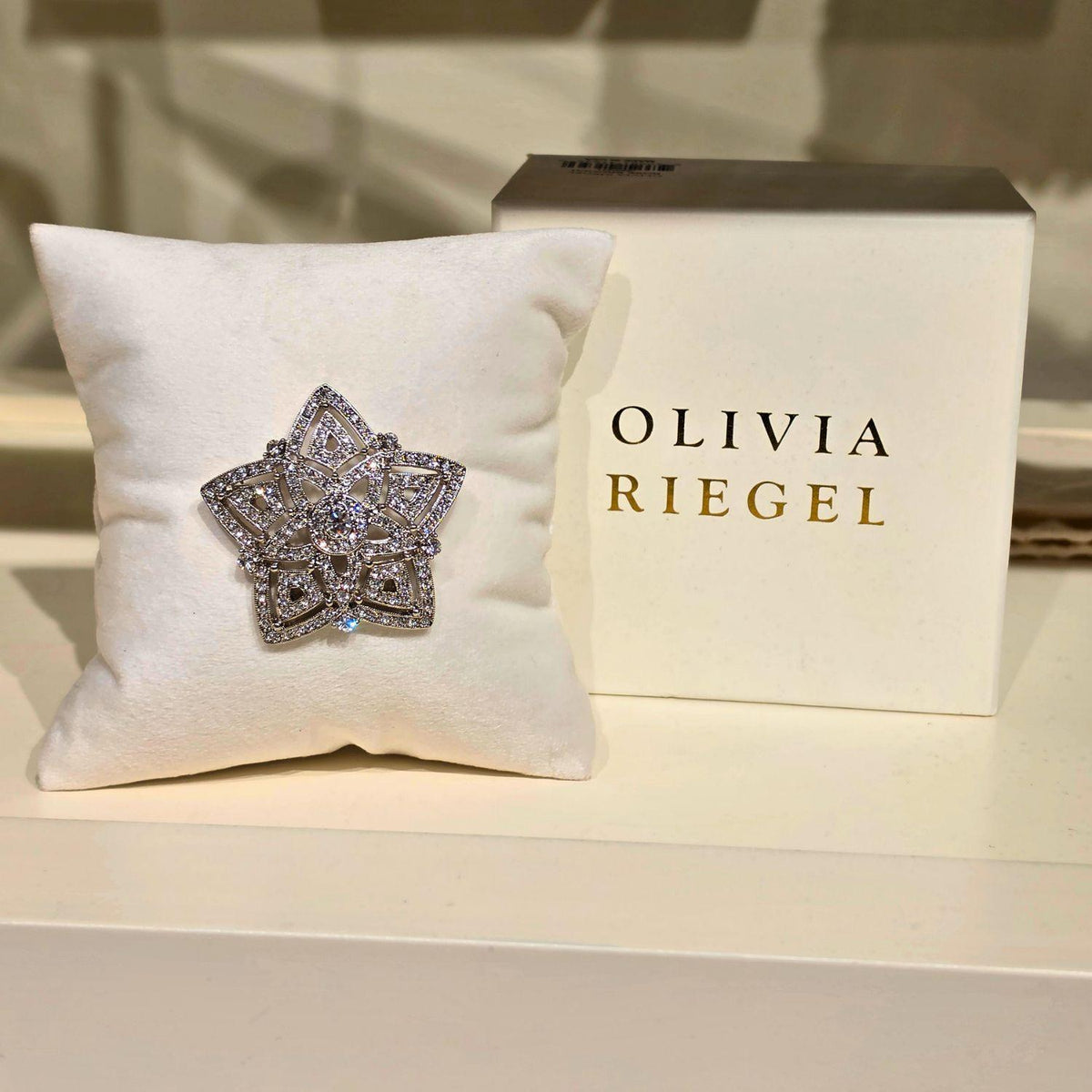 Silver Star Brooch with white gift box.