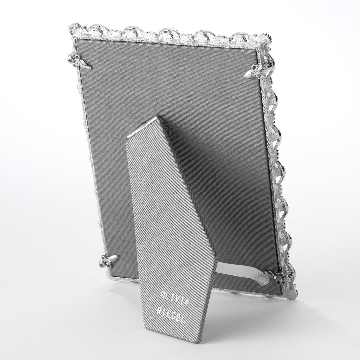 Gray Silk Back of Silver Evil Eye Frame.