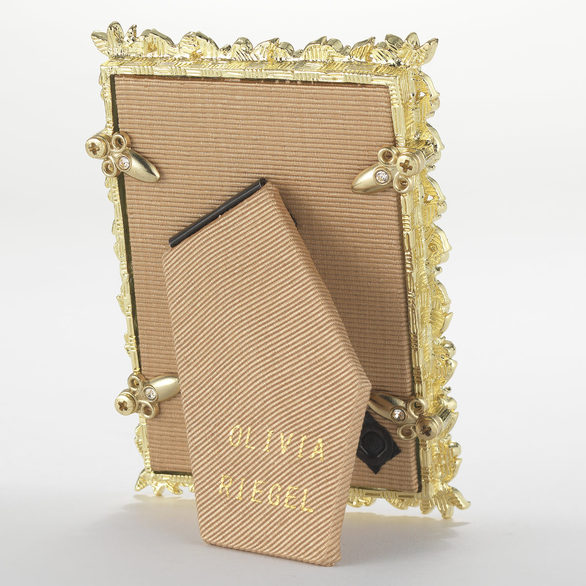 Tan silk back of Gold Victoria Frame.