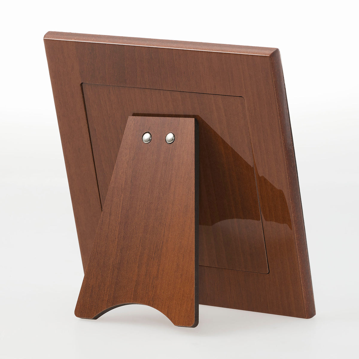 Medium brown wooden back of Sterling Cub Frame.