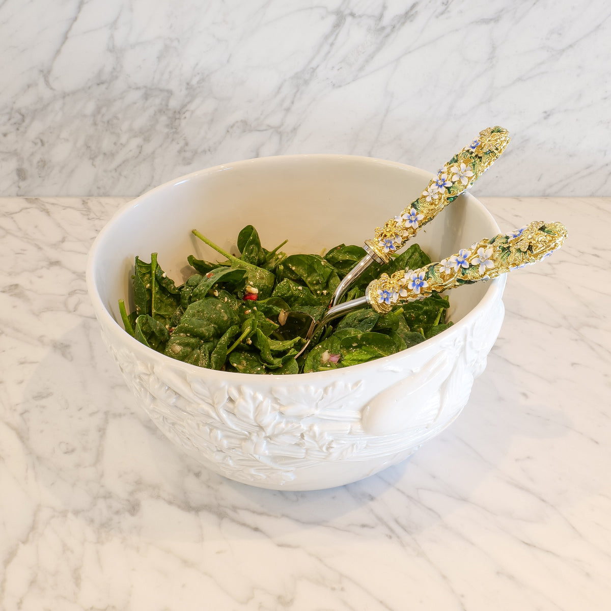 Daphne Salad Serving Set in white bowl on white counter.