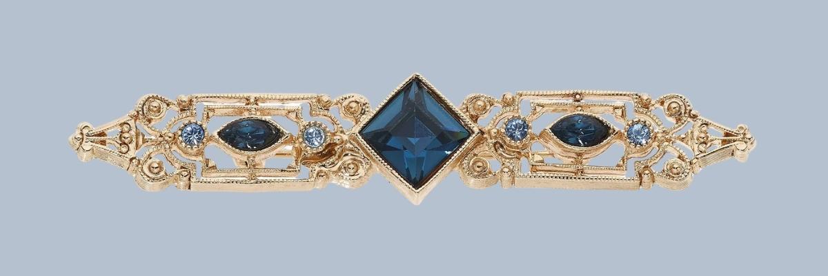 bar brooch on blue background