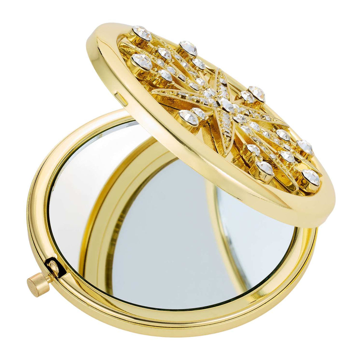 Open Starburst Compact showing interior mirror.