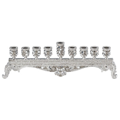 Short silver menorah with clear crystals.