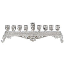  Short silver menorah with clear crystals.