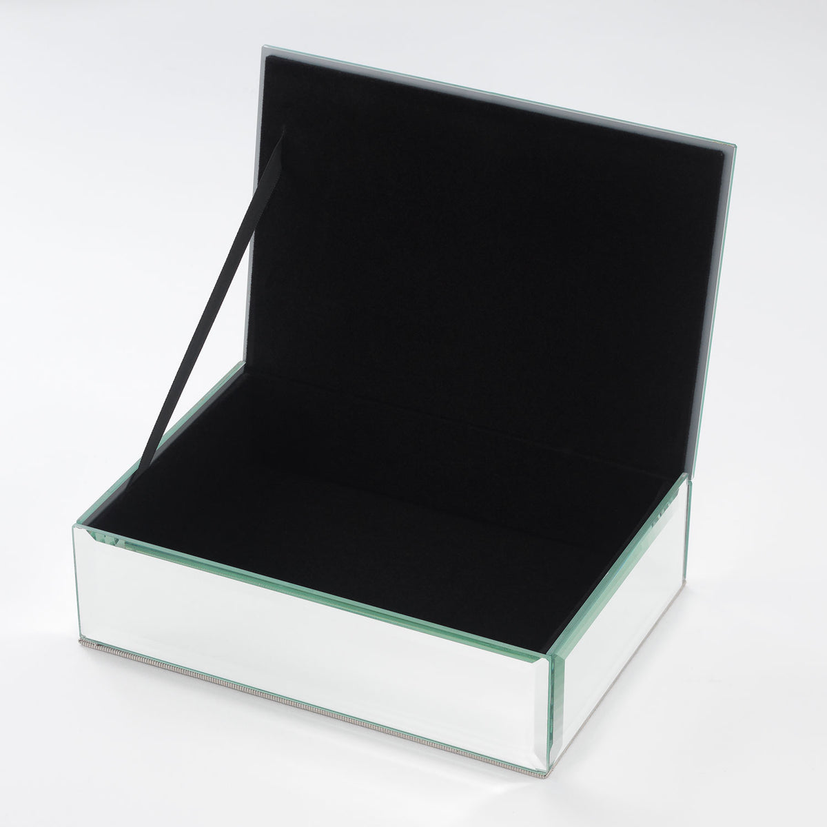 Open Botanica Box with black velvet interior.