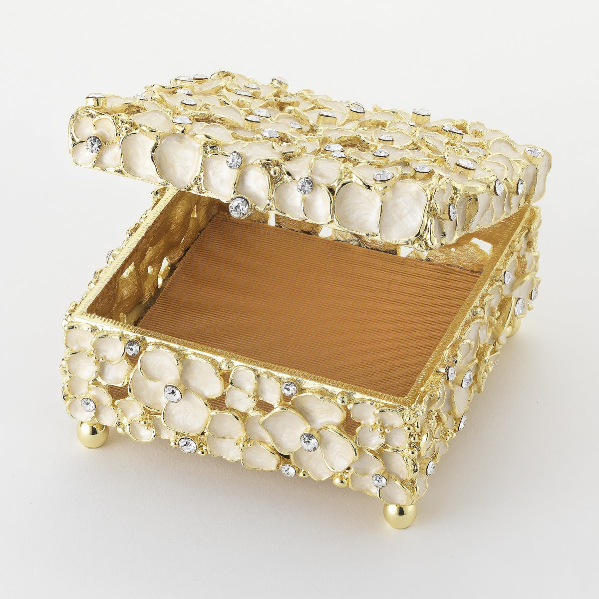 Open Dogwood Box with tan silk-lined bottom.