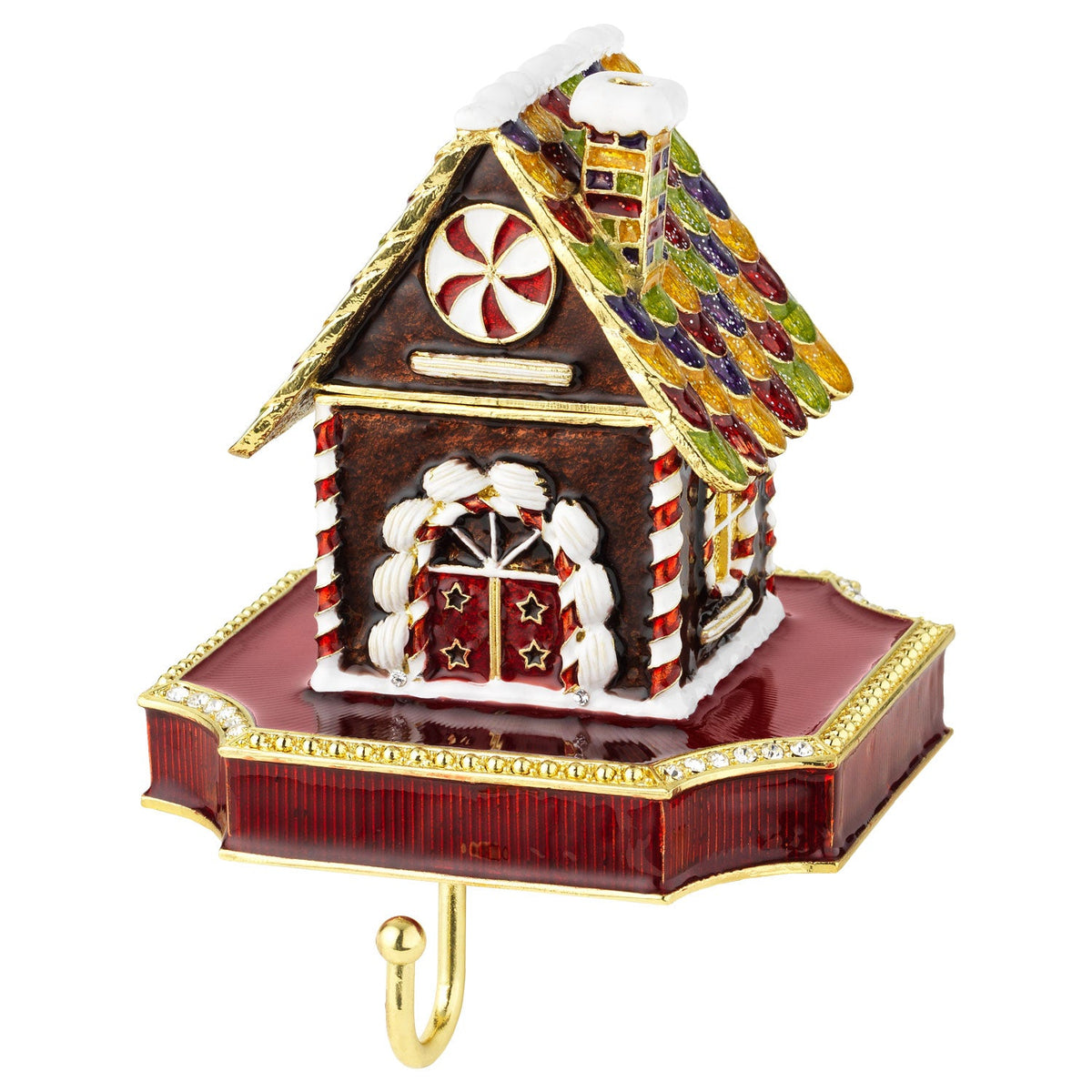 Gingerbread House Stocking Holder with dark red enamel base, gold trim, and candy-colored accents.